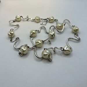 Cecile Jeanne Paris, Faux pearls and silver tone necklace.